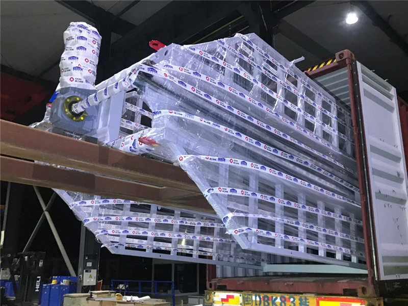 A máquina automática de blocos ZN900CG da QGM com sistema de rack de cura foi enviada para El Salvador