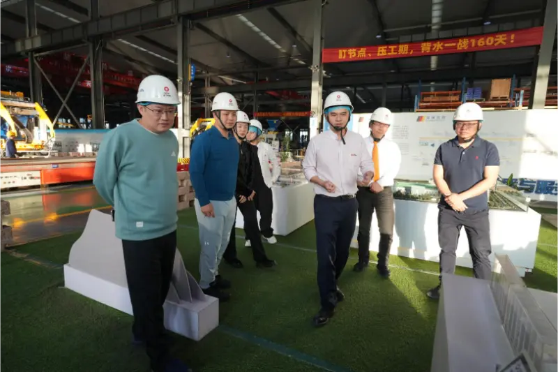 A Associação de Estudantes Estrangeiros Retornados de Nan'an visitou e conduziu pesquisas na Quangong Machinery Co., Ltd.